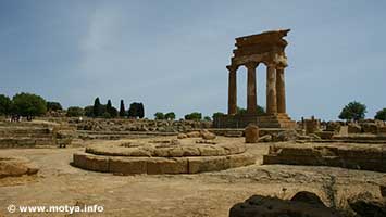 The temple of the Dioscuri and an altar The temple of the Dioscuri and an altar