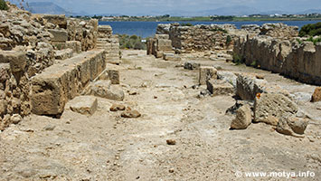 The left side of the gates of Motya. Ahead the main gate in the walls leading to the road. The left side of the gates of Motya. Ahead the main gate in the walls leading to the road.