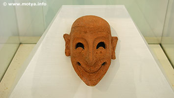 The mask. Masks in terracotta were often used to fend off the evil spirits in funerals and were found next to the inhumated in mainly punic tombs. Similar masks have been found in other towns like Tharros, Sulcis, Nora The mask. Masks in terracotta were often used to fend off the evil spirits in funerals and were found next to the inhumated in mainly punic tombs. Similar masks have been found in other towns like Tharros, Sulcis, Nora