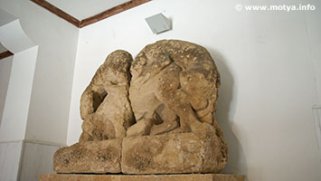 Probably these two large sculptures were placed above the gates or above an entrance to a temple, two lions attacking a bull. The sculpture is in sandstone. Probably these two large sculptures were placed above the gates or above an entrance to a temple, two lions attacking a bull. The sculpture is in sandstone.