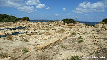 The area of the northwest gate with probably a small sanctuary adiacent to the gate. In the background the Egadian islands. The area of the northwest gate with probably a small sanctuary adiacent to the gate. In the background the Egadian islands.