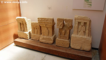 Steles of the tofet of Motya. Female figures and stylized figures, some with inscriptions. Steles of the tofet of Motya. Female figures and stylized figures, some with inscriptions.