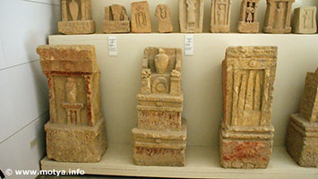 Stele with an inscription, this type of large stele is also interpreted as a throne. Stele with an inscription, this type of large stele is also interpreted as a throne.